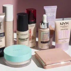 Verschiedene Foundations und Make-up-Produkte von Marken wie Elf, Fenty Beauty, Catrice, L'Oréal, Maybelline, Essence und NYX.